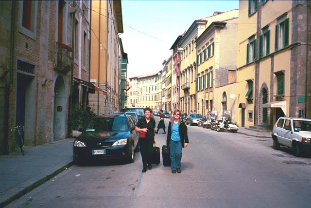 Freda and Rosie on a street in Pisa