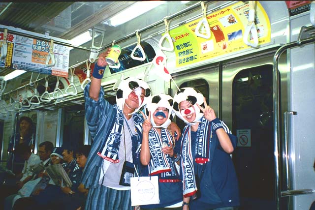 Japanese kids on the way to soccer game
