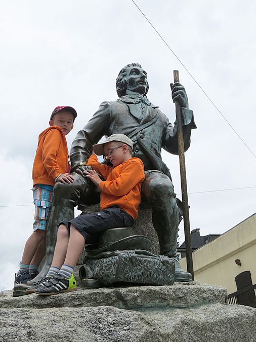 Kids on statue