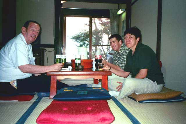 Sipping plum wine in a room at a Japanese Inn